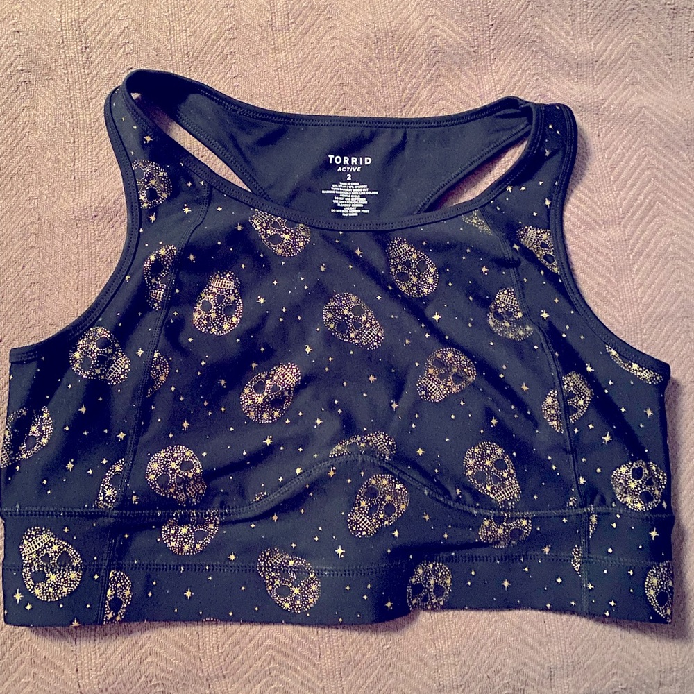 Gold skull black background longline torrid sports bra